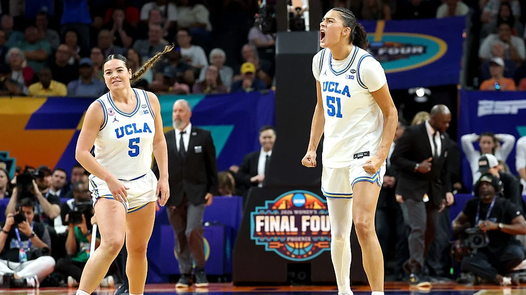 Lauren Betts and a UCLA teammate celebrating during the 2026 NCAA women's championship game