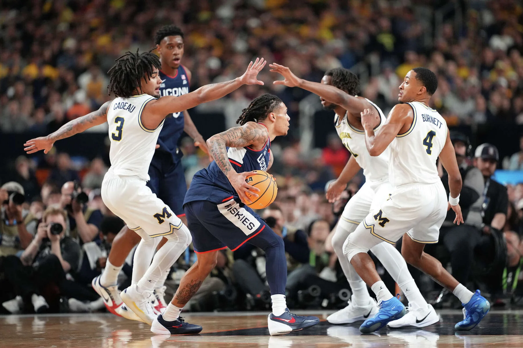 NCAA Men's Basketball Champions by Year and School