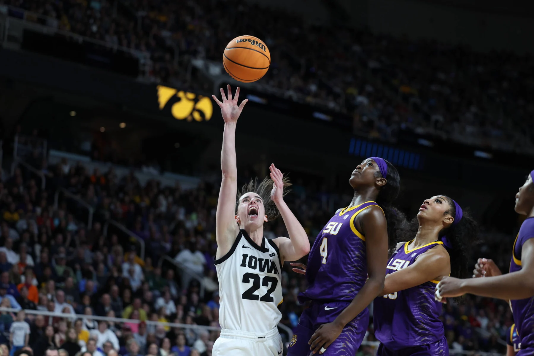 Caitlin Clark playing for Iowa during the NCAA women's basketball tournament