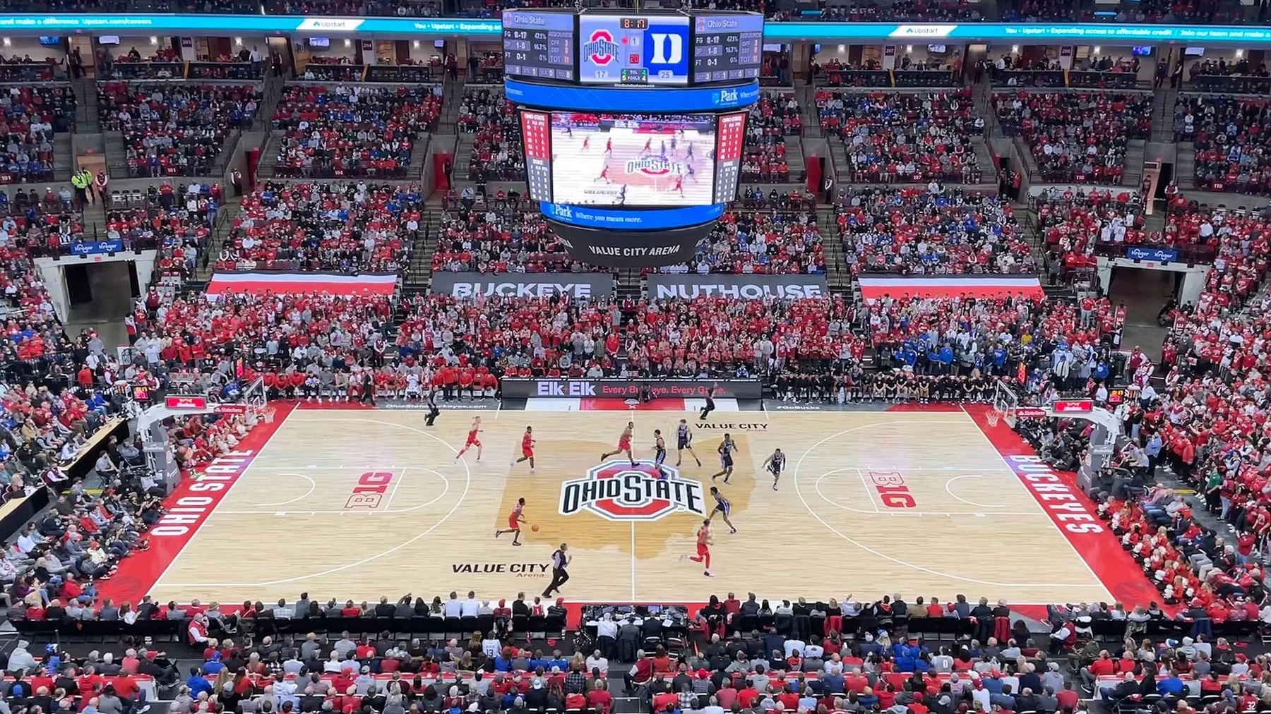Duke and Ohio State players spaced across the floor in a men's college basketball game